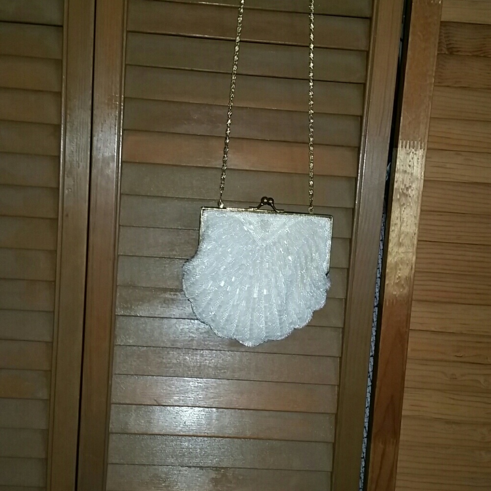 White clutch with hand beading
